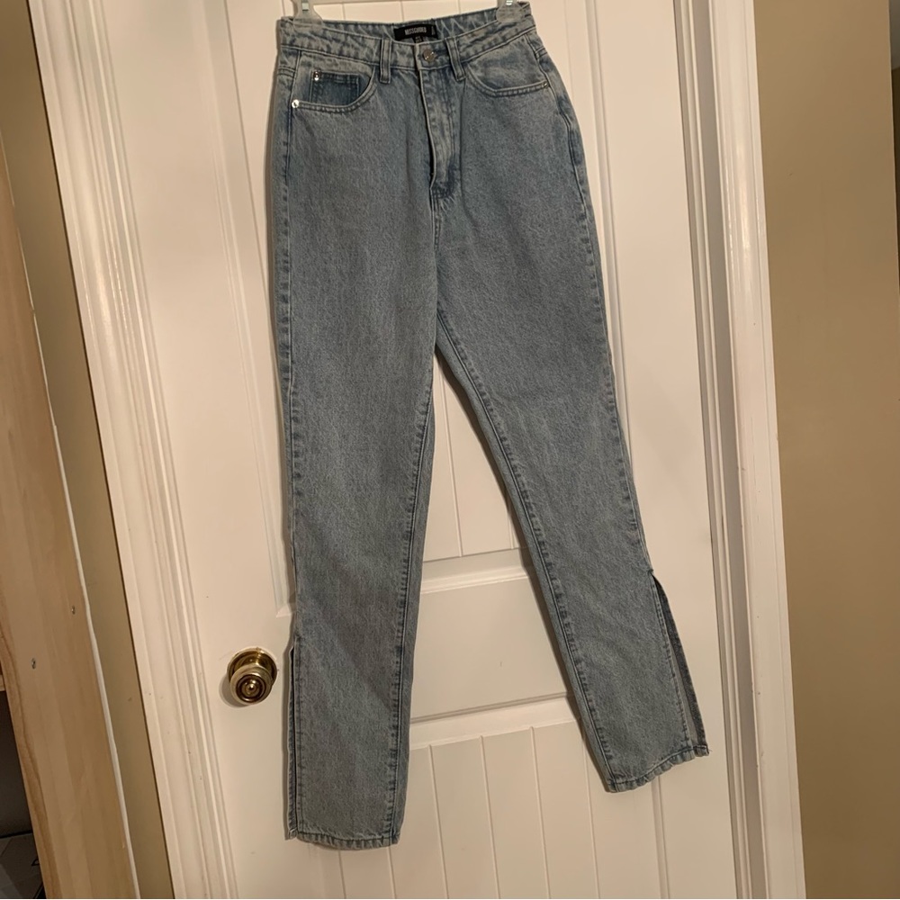 High waisted jeans with slit ends